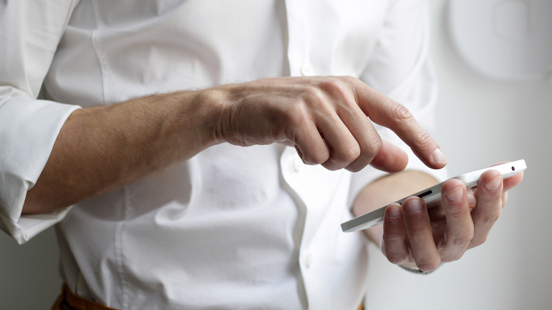 man checking his mobile